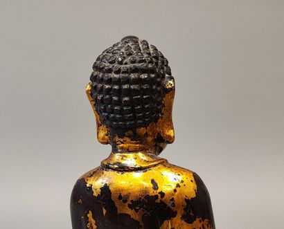VIETNAM, circa 1900. Buddha seated on a lotus...