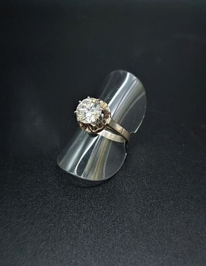 White gold solitaire set with a 2.2-carat...