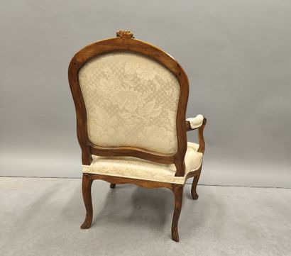 Flat-back armchair in walnut carved with...