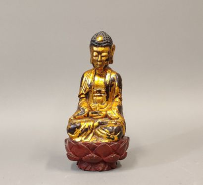VIETNAM, circa 1900. Buddha seated on a lotus...