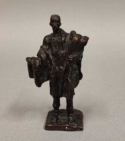 Gaston BROQUET (1880-1947). Woman with bundles
Brown...