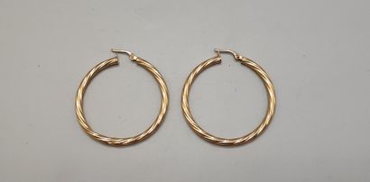 Pair of twisted creole earrings in yellow...