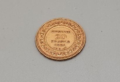 Gold coin 20 francs or Tunisie 1901. 
Weight...