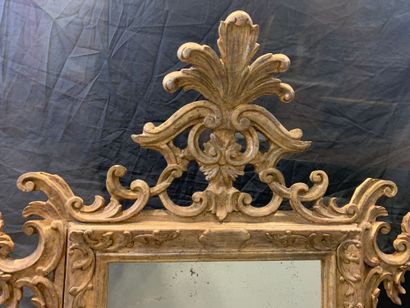 Venetian-style carved wood and silver mirror...
