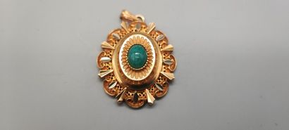 Gold pendant with oval medallion set with...