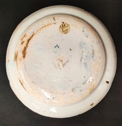ROUEN 18th century. Earthenware plate decorated...