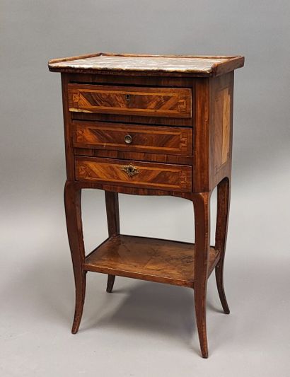 Veneered bedside table opening with three...
