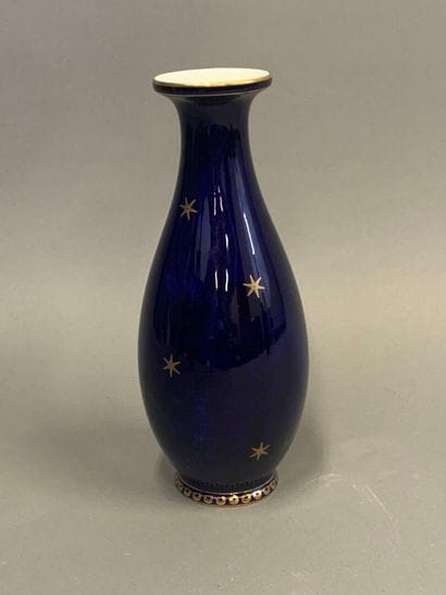 SEVRES. Baluster-shaped vase with gilded...