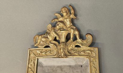 Pair of bronze two-light sconces with cherub...