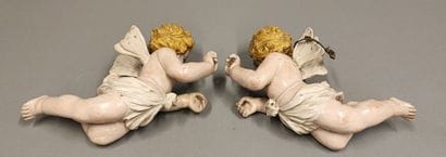ITALY. Pair of cherubs in carved lacquered...