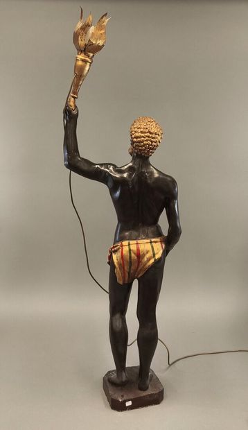 Painted and gilded wood torch holder featuring...