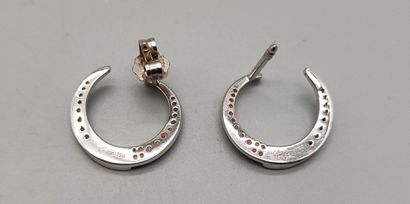 Pair of crescent-shaped earrings in white...