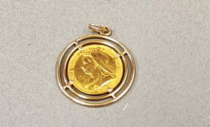 18K (750) gold pendant set with an 1888 sovereign....