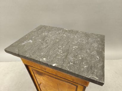 Burr wood night table opening with a door...