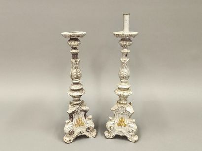 Pair of silver-plated carved wood candelabra...