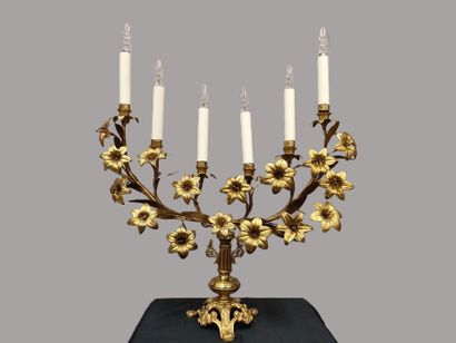 Brass candlestick with sixteen flowers and...