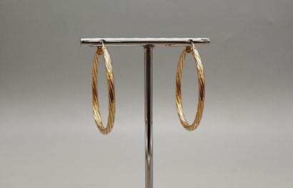 Pair of twisted creole earrings in yellow...