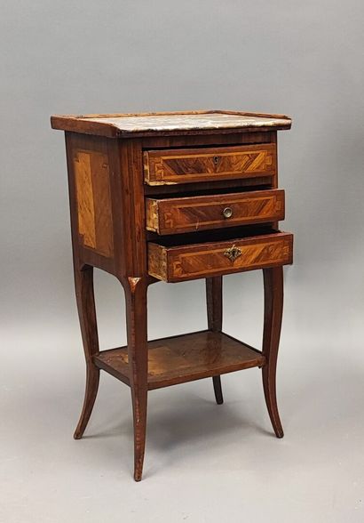 Veneered bedside table opening with three...
