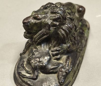 Antoine-Louis BARYE (1795-1875). Lion holding...