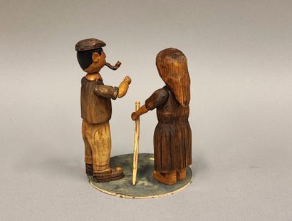 Couple de personnages articulés en bois sculpté...