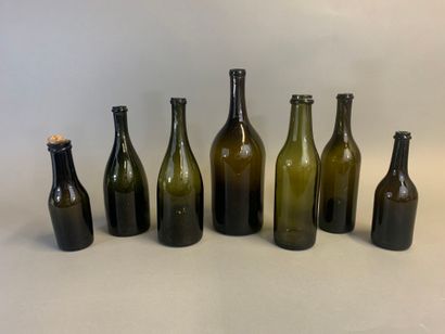 Seven antique bottles, mouth-blown olive...