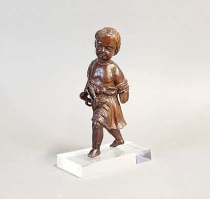 Putto with bugle. Wooden statuette carved...