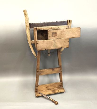 Saw sharpening workbench with saw.