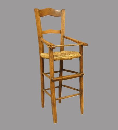 Chaise haute d'enfant en bois à assise paillée
H....