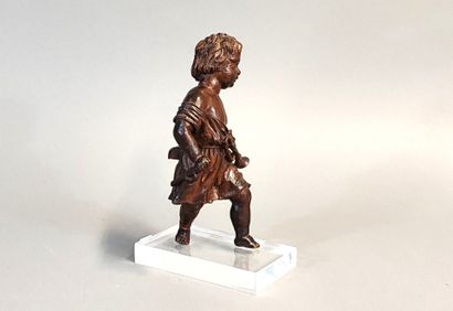Putto with bugle. Wooden statuette carved...