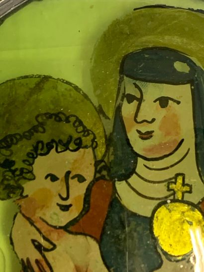 Oval medallion depicting the Virgin and Child,...