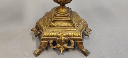 Pair of bronze three-light candlesticks decorated...