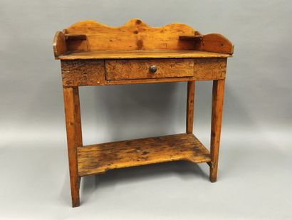 Petite table de toilette en pin verni ouvrant...