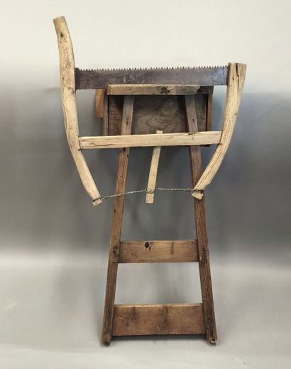 Saw sharpening workbench with saw.