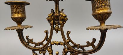 Pair of bronze three-light candlesticks decorated...