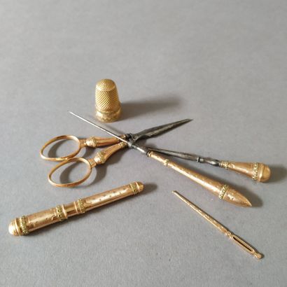 A gold sewing kit in a bone case, 19th century
The...