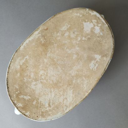 NEVERS, 19th century
Oval planter with faded...