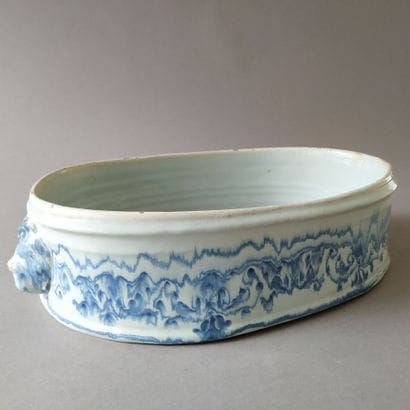 NEVERS, 19th century
Oval planter with faded...