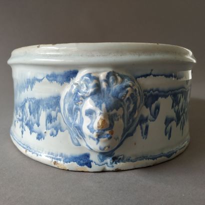 NEVERS, 19th century
Oval planter with faded...