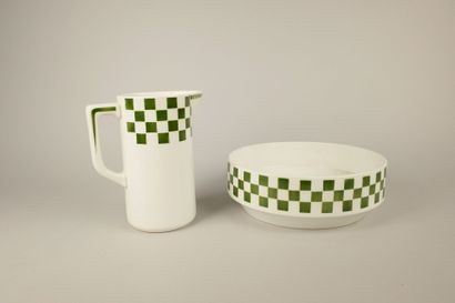 SAINT AMAND. Earthenware jug and basin decorated...