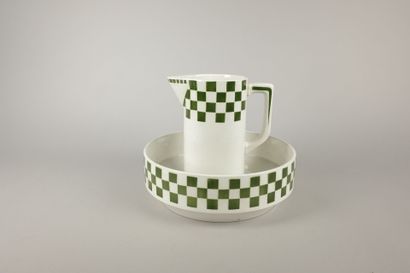SAINT AMAND. Earthenware jug and basin decorated...