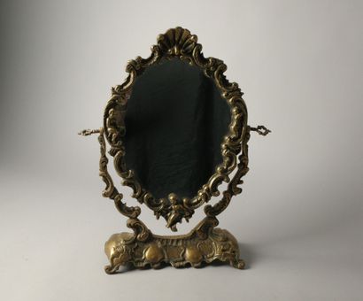 Psyché or table mirror in bronze with cherubs,...