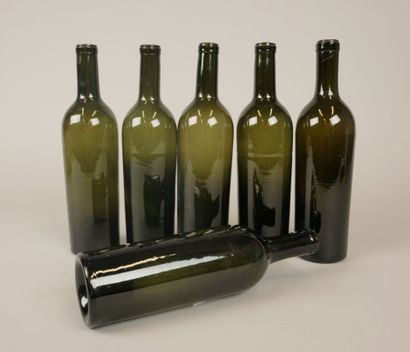 Six Bordeaux-shaped bottles in glass of various...