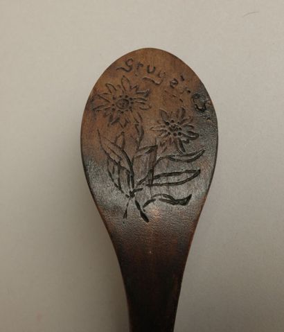 Set of four wooden cream scoops including:...