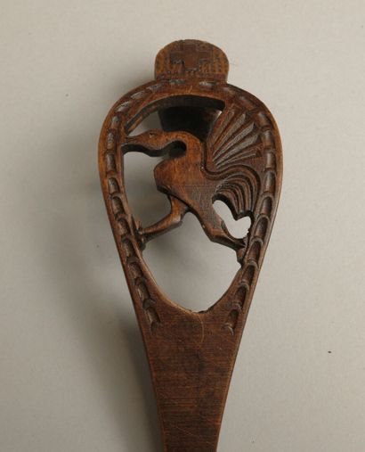Set of four wooden cream scoops including:...