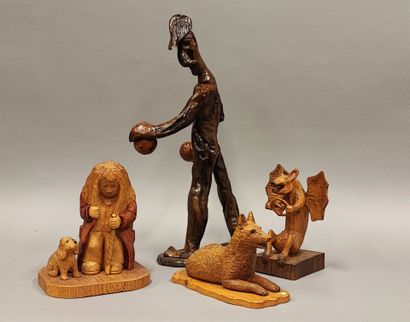 Small devil holding a shuttlecock, carved...