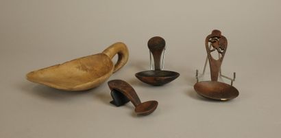Set of four wooden cream scoops including:...