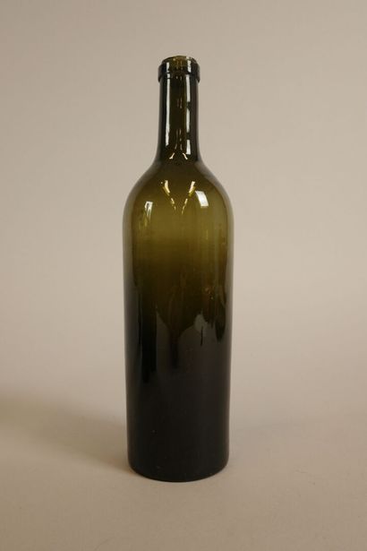Six Bordeaux-shaped bottles in glass of various...