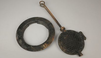 Cast-iron waffle mould with stand. Mould...