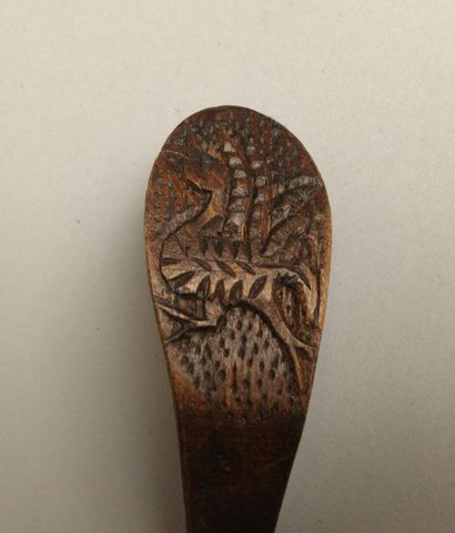 Set of four wooden cream scoops including:...