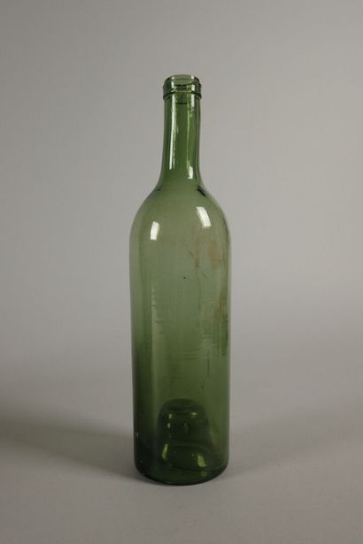 Six Bordeaux-shaped bottles in glass of various...